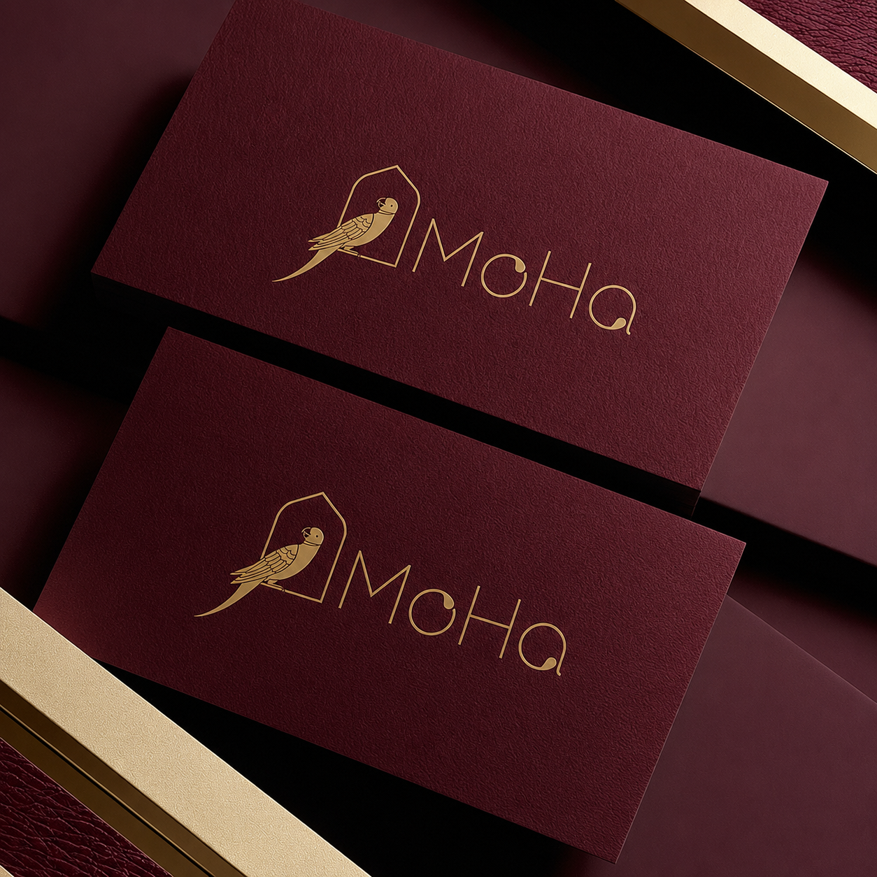 MoHa burgundy business cards with gold logo