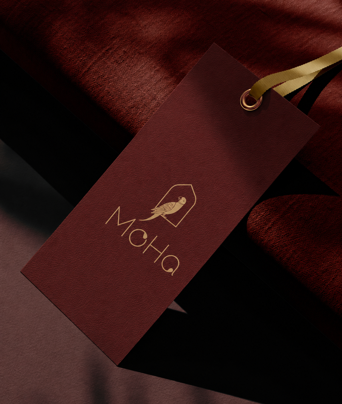 MoHa hang tag with gold logo and cord